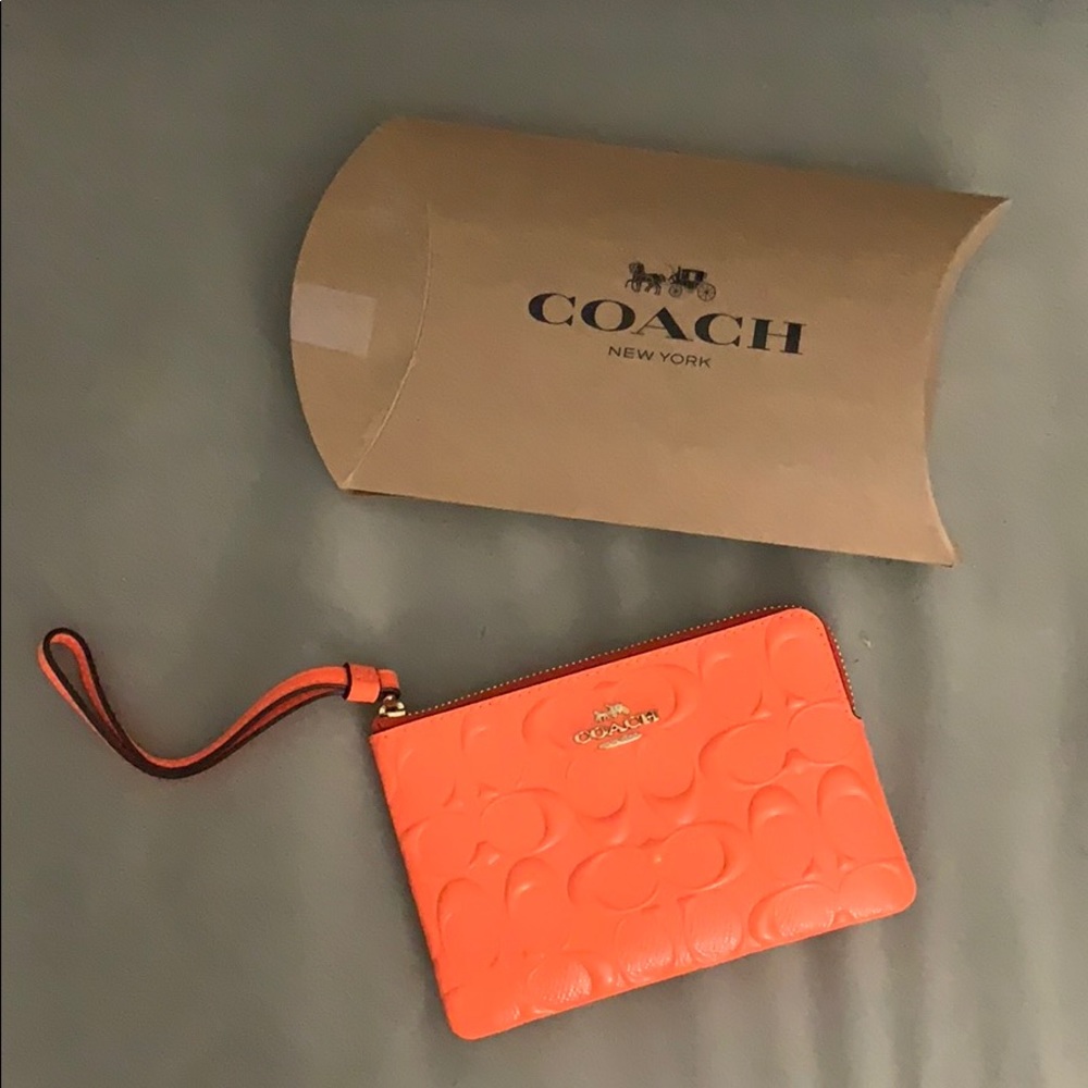 Coach neon orange wristlet NWT